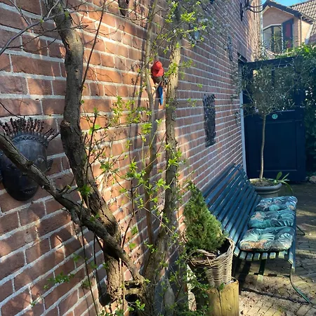 펜션 In Het Koetshuis *